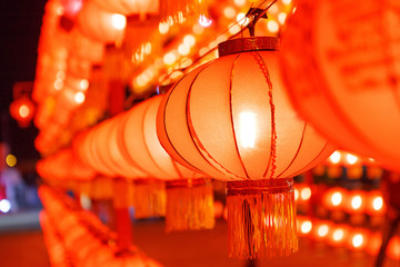 Close up chinese lanterns background during new year festival,Chinese New Year decorations,Spot focus. © KM.Photo