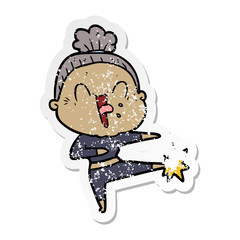 distressed sticker of a cartoon happy old woman