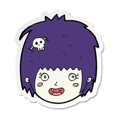 sticker of a cartoon happy vampire girl face