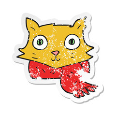 retro distressed sticker of a cartoon cat wearing scarf
