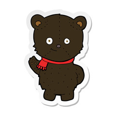 sticker of a cute cartoon black bear