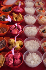 Food offerings on a table to appease the wandering spirits during the Chinese Hungry Ghost Festival 