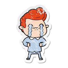 distressed sticker of a cartoon man crying