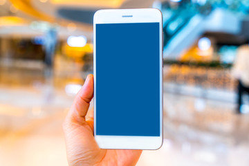 Hold your cell phone in the mall..