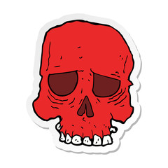 sticker of a cartoon spooky skull