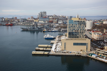 2013 - Sea facade in the capital of the Far East, the city of Vladivostok. Sea trading port with...