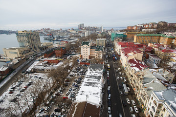2013 - Sea facade in the capital of the Far East, the city of Vladivostok. Sea trading port with...