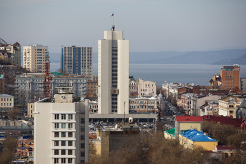 2013 - Sea facade in the capital of the Far East, the city of Vladivostok. Sea trading port with...