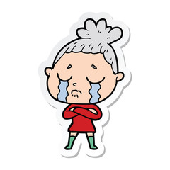 sticker of a cartoon crying woman