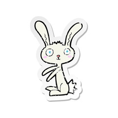 Fototapeta na wymiar retro distressed sticker of a cartoon rabbit