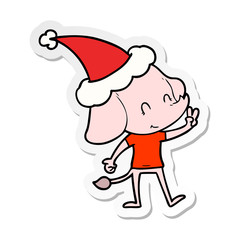 cute sticker cartoon of a elephant wearing santa hat