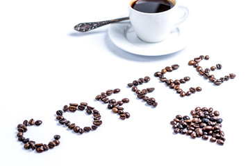 Cup of coffee and lettering coffee