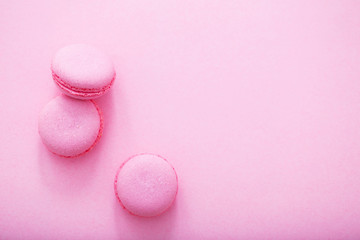 pink macaroons on pink background