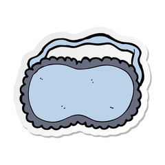 sticker of a cartoon sleeping mask