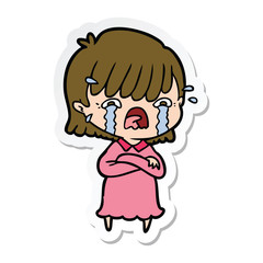 sticker of a cartoon girl crying