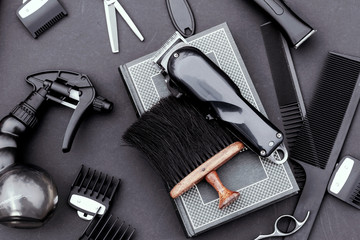 Background for male salon, hairdresser, black. Tools hairdresser, scissors, comb, razor.