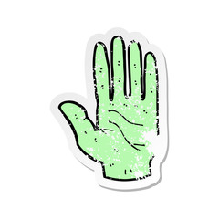 retro distressed sticker of a cartoon zombie hand