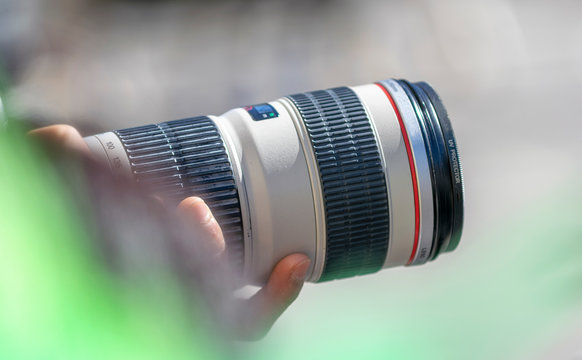 Photographing at a major holiday event. Big zoom lens surrounded by bokeh colors