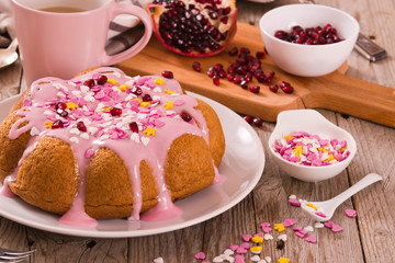 Cake with pink frosting. 