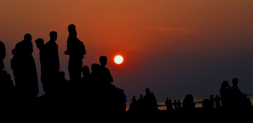 Sunset with people, silhouette