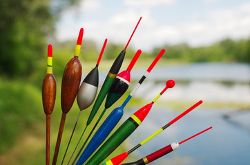 Fishing floats on the background of the river © yrafoto