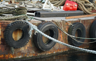 Scene of the ship of old rusted iron anchoring in the port