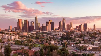 Aerial time lapse in motion or hyperlapse over Echo Park of downtown Los Angeles, California skyline and skyscrapers from above on a sunny day during golden hour before sunset. - Powered by Adobe