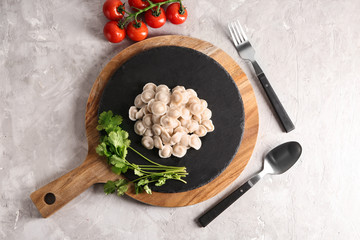 Tasty dumplings on slate plate