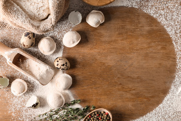 Ingredients for tasty dumplings and place for text on wooden background