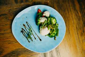 Food photo. Restaurant dishes on the wooden table.
