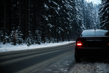 Car on road at snowy winter resort