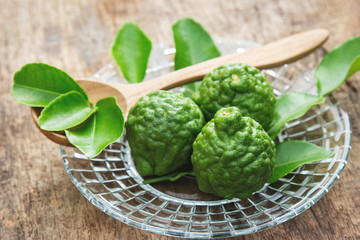 Bergamot fruit or kaffir on dish 