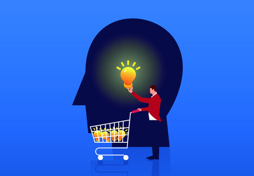 Businessman pushing a shopping cart to buy ideas and bulbs from the brain