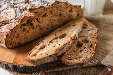 Tasty sliced bread on table, closeup