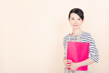 Fototapeta premium エプロンの女性