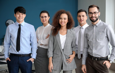 Team of young business people in office