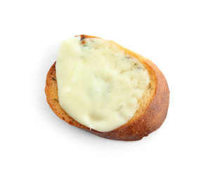 Sliced bread with cheese and garlic on white background