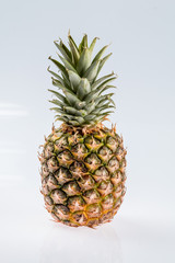 Fototapeta premium cheeseburger with pineapple on a plate with fresh bacon and ripe pineapple