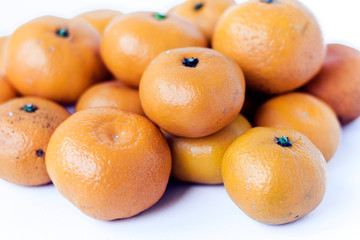Fresh mandarin oranges (Citrus reticulata), vegetarian concept.