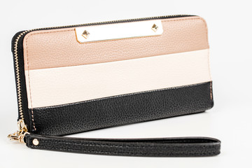 Naklejka premium Leather women wallet on white background