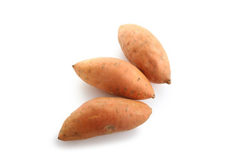 Raw sweet potato on white background