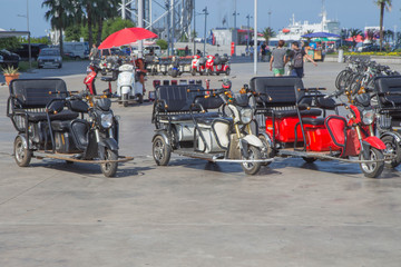 Electric tricycle scooters for rent on Batumi New Boulevard