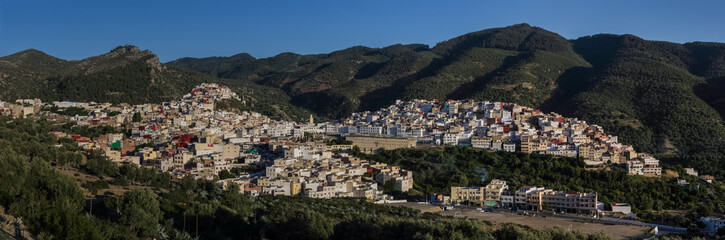 Fototapeta na wymiar Panorama view over the holy city of Moulay Idriss Zerhoun including the tomb and Zawiya of Moulay Idriss, Middle Atlas, Morocco, North Africa