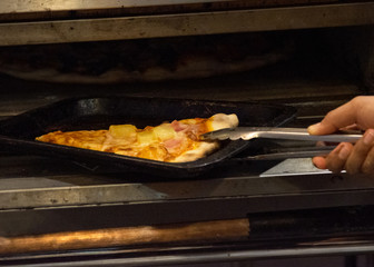 chef prepares delicious pizzas on the kitchen