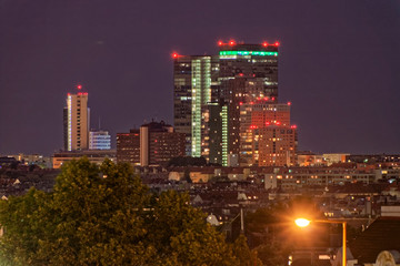 Naklejka premium Vienna by night - view of the lighted office blocks.