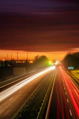 Printed kitchen splashbacks Highway at night  the light trails on motorway highway during a dramatic sunset