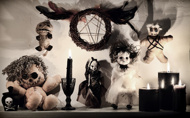 Burning black candles, weird voodoo dolls and pentagram. Magic gothic ritual. Wicca, esoteric,...