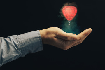 Human holding balloon in palm. Mixed media.