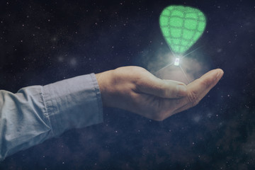 Human holding balloon in palm. Mixed media.