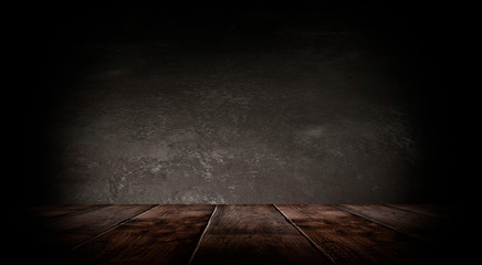 Dark empty room with brick walls and neon lights, smoke, rays. Brick wall, concrete and wooden table.